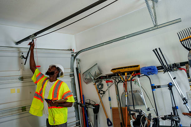 Professional Garage Door Panel Replacement technician working in Brockport, NY